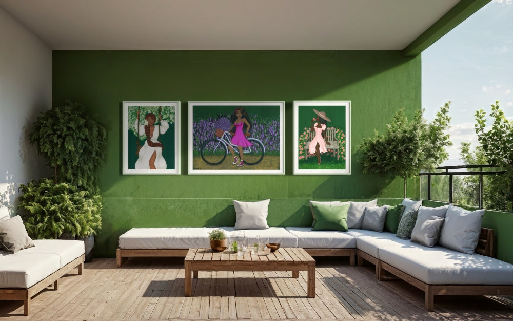 Framed prints of Black women with natural hair surrounded by lush botanical gardens, painted in gouache.