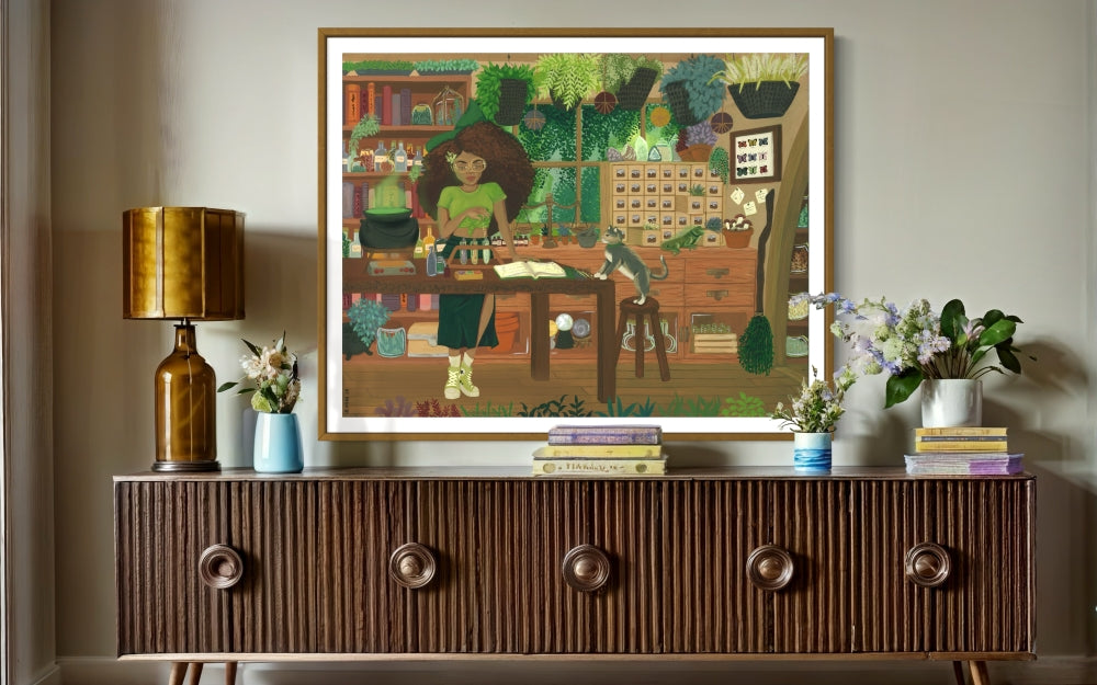 Framed fine art print of Black woman with natural hair surrounded by verdant lush apothecary greenhouse, painted in gouache.